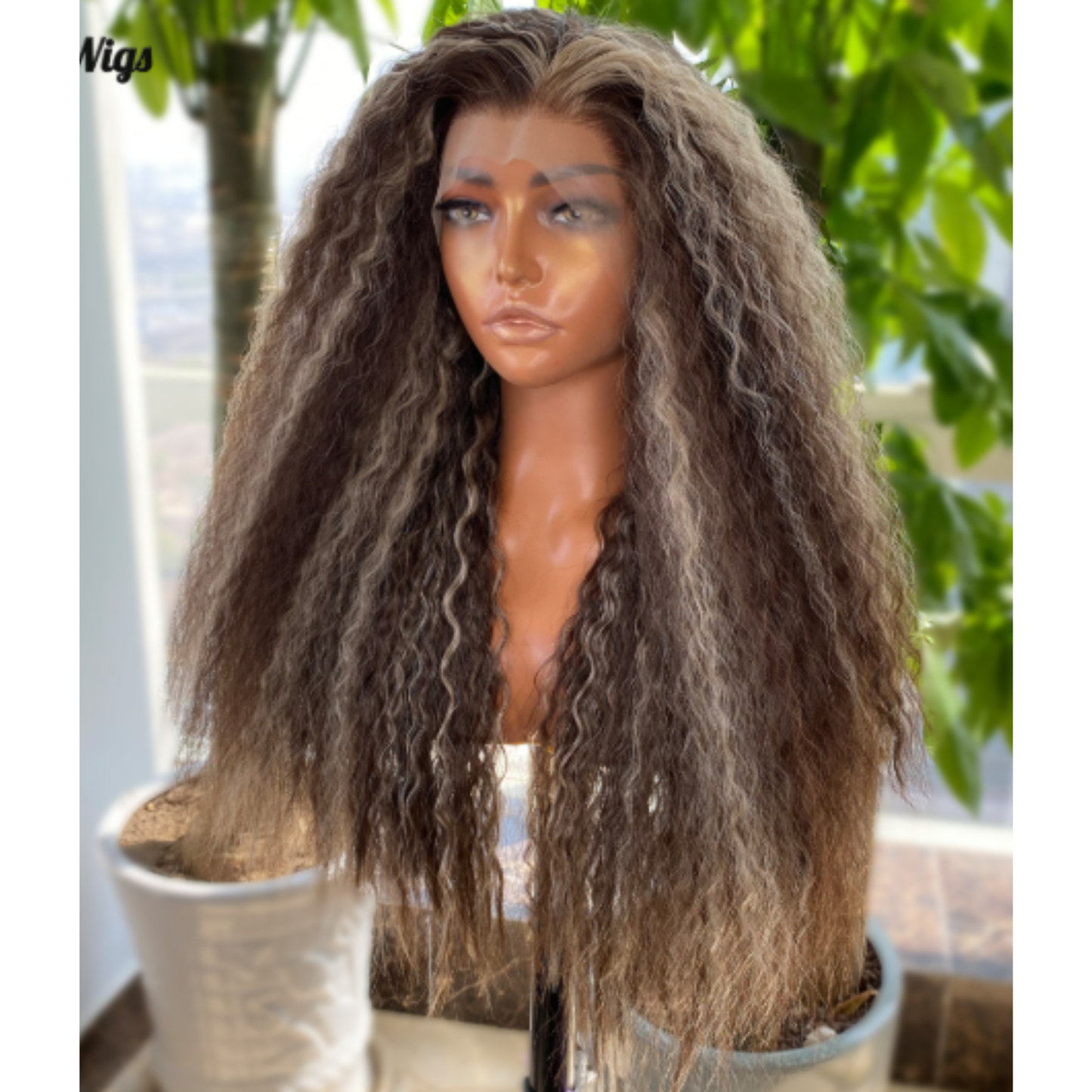 Futura lace front curly wig - 22inch - Brunette with Icy Highlights