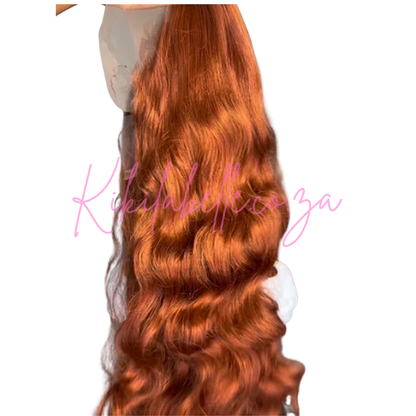 Atarah - 28" Human hair blend - wavy curl- Copper