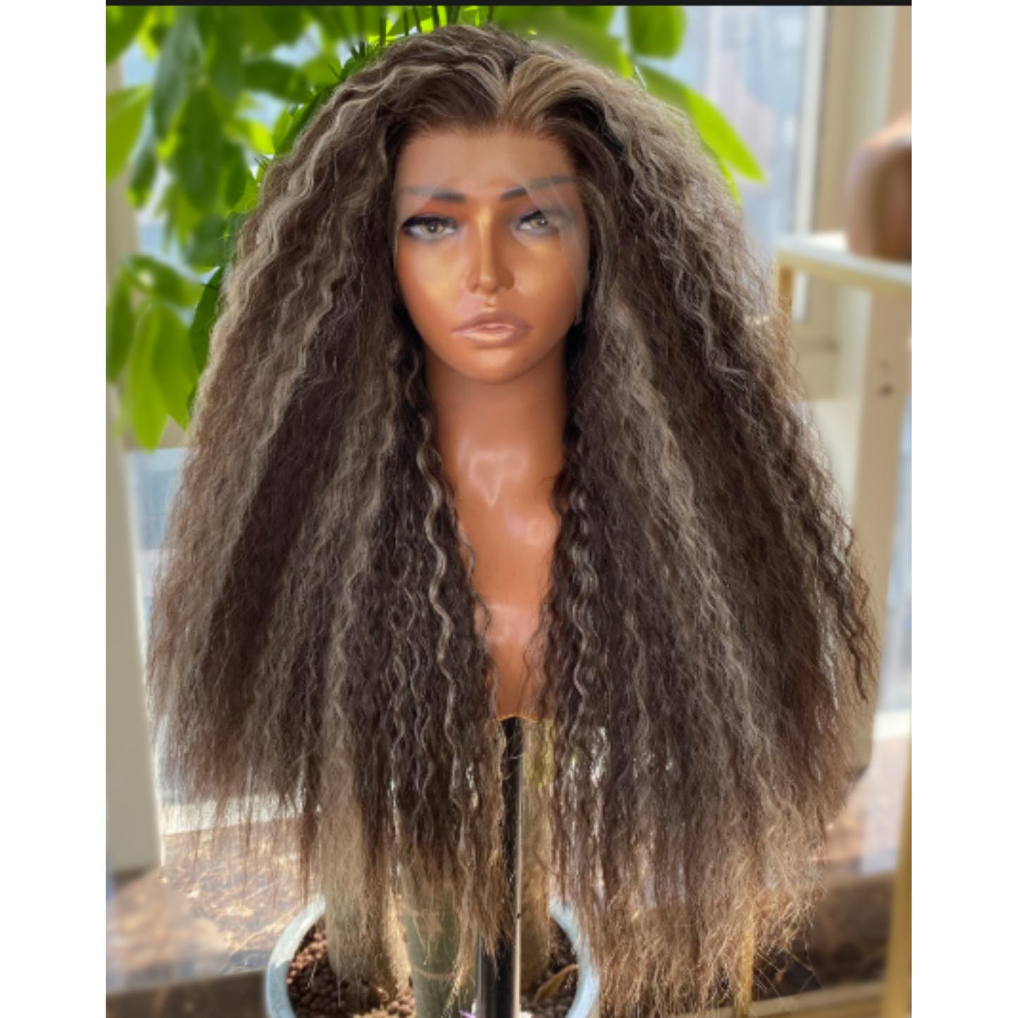 Futura lace front curly wig - 22inch - Brunette with Icy Highlights